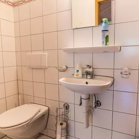 Haus Binelti, *